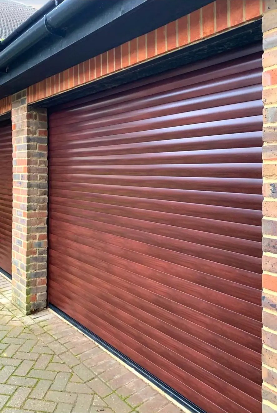 Wood-effect roller garage door fitted by Excel